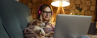 Woman with her dog enjoying Quantum Fiber Internet reliability