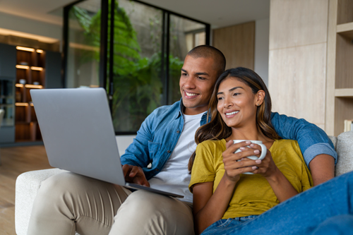 Couple using WiFi with unlimited internet Couple using WiFi with unlimited internet