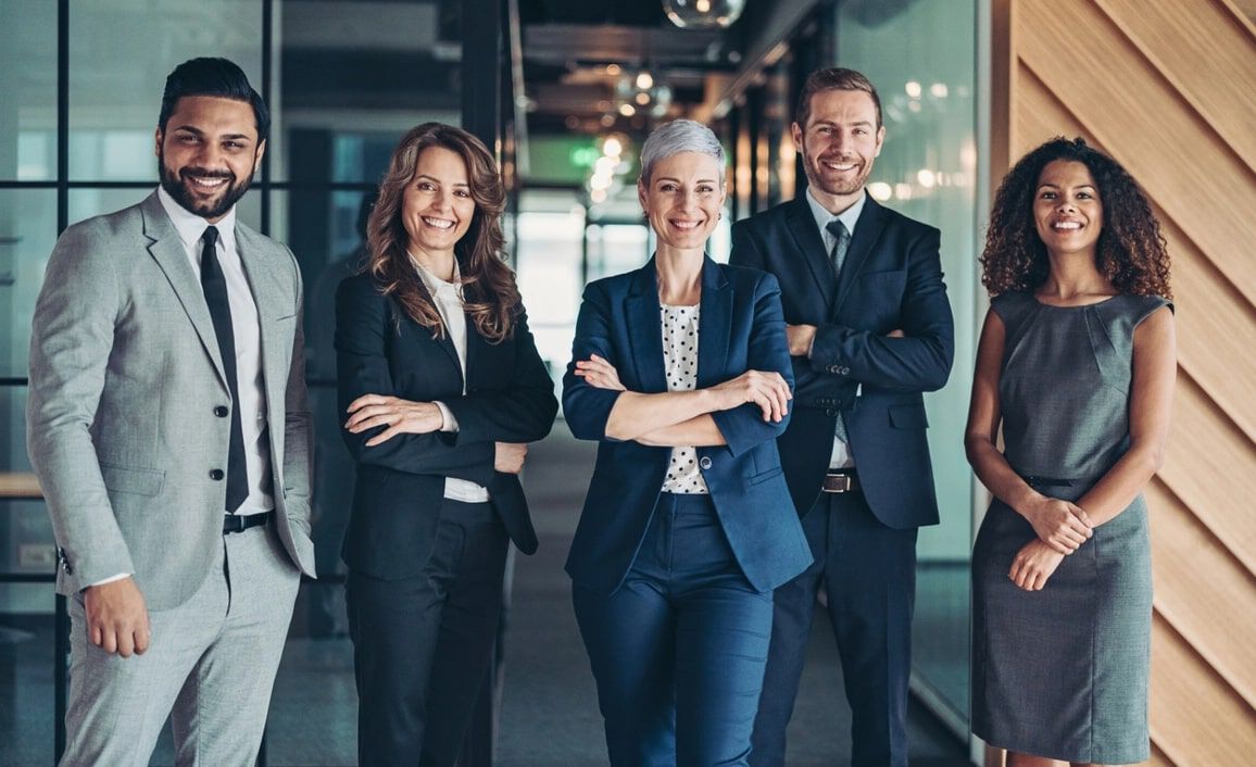well-dressed employees smiling well-dressed employees smiling