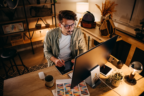 Guy using Quantum Fiber Internet for personal and work use