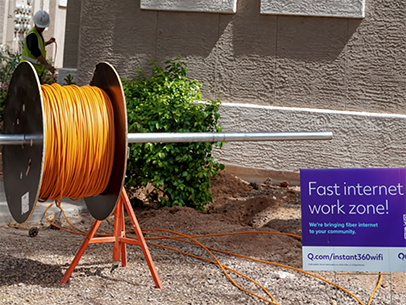 Technician installing Quantum Fiber wiring
