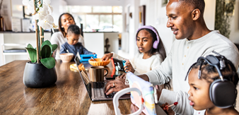 Family using Quantum Fiber and enjoying the benefits of equal upload and download speeds
